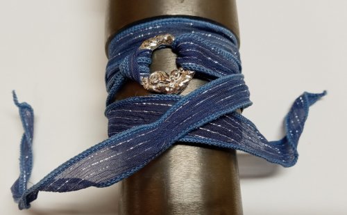 Judy Larson's Ribbon Wrapped Bracelet tips - , Wire Jewelry Design, Design,  running vertically across its surface